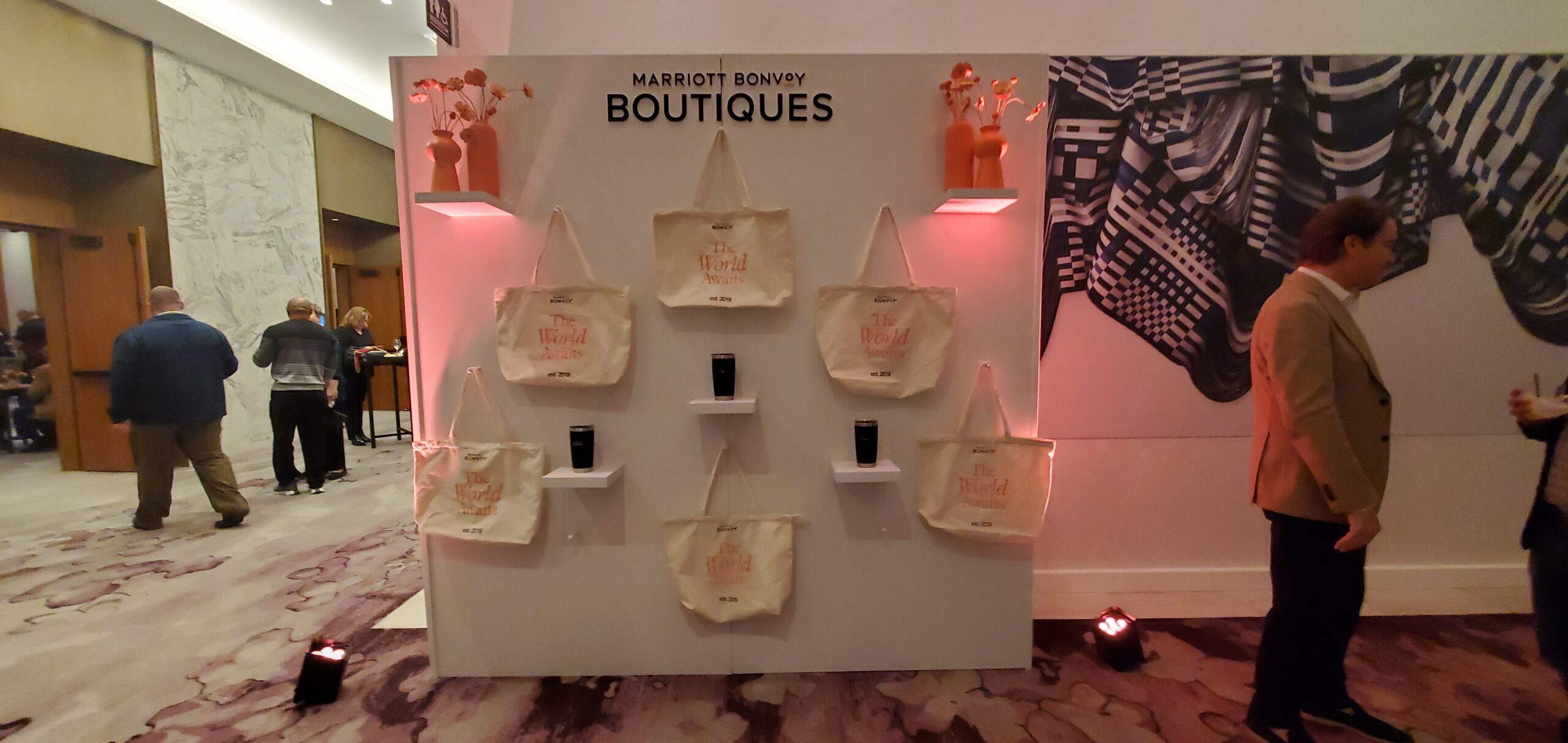 Bonvoy 5th Anniversary canvas tote bag display wall at Marriott Bonvoy Boutiques