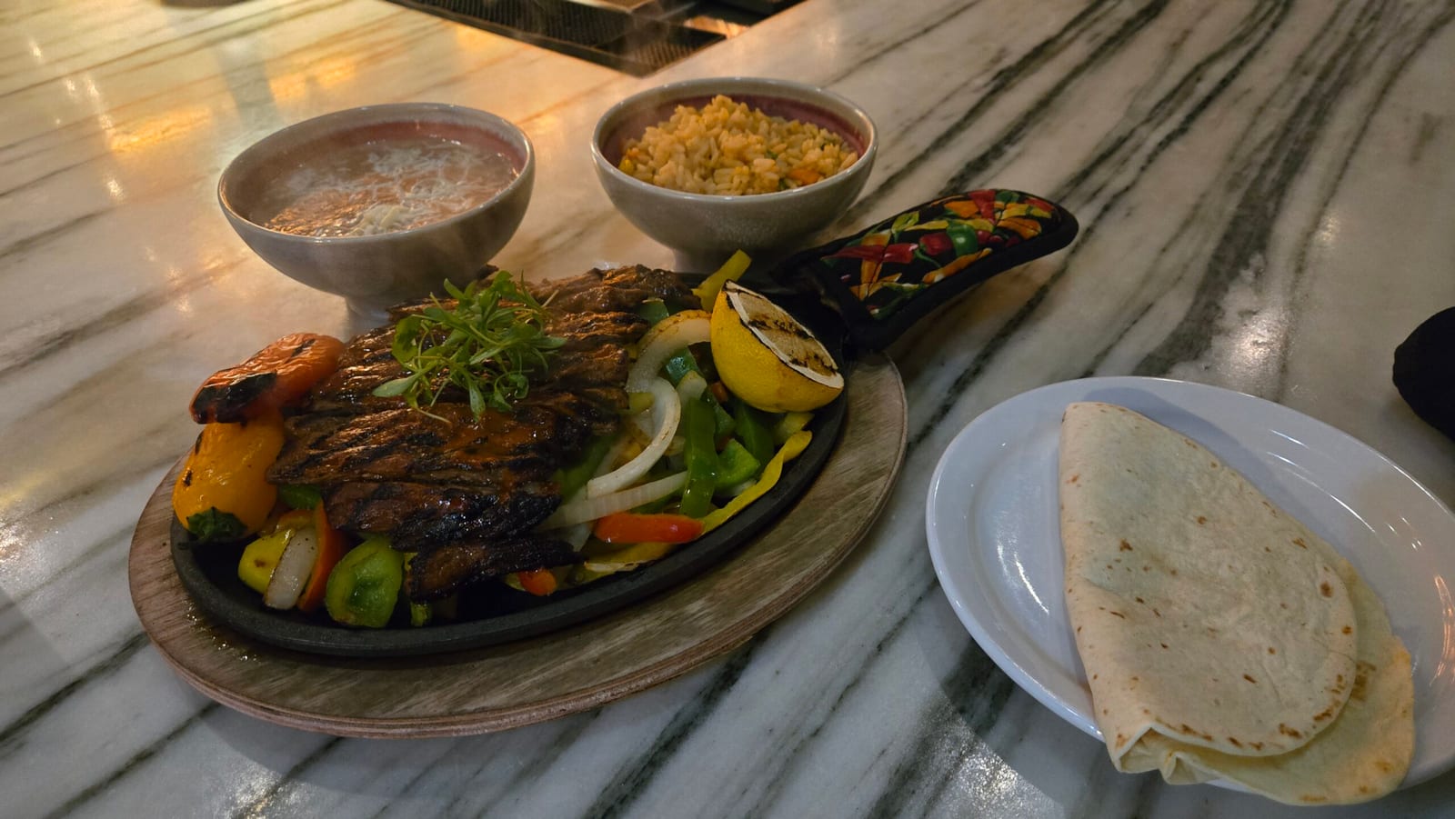 Hotel Dena Agents Only sizzling skirt steak fajitas
