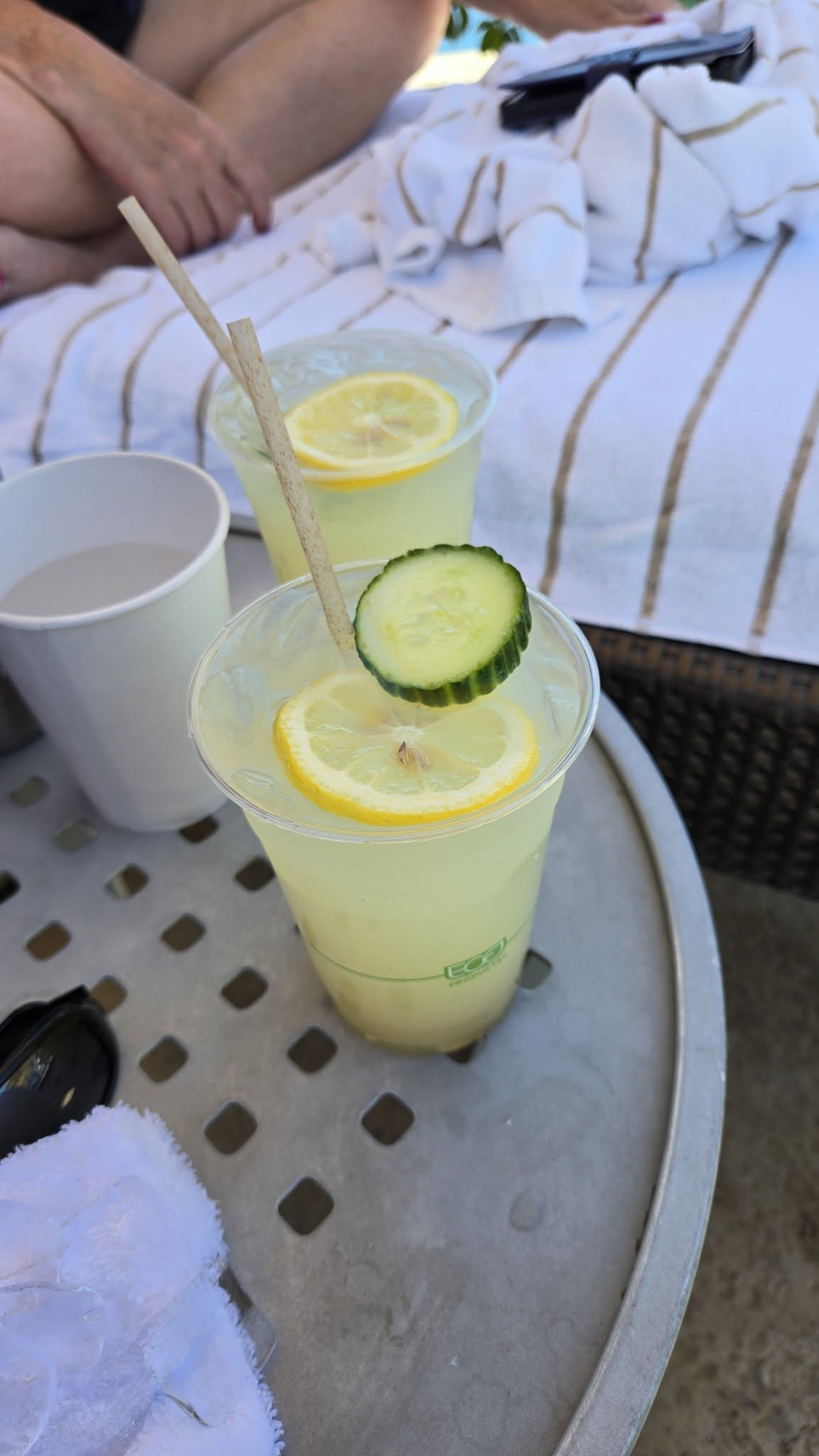 Refreshing poolside cucumber-mint lemonades on ice