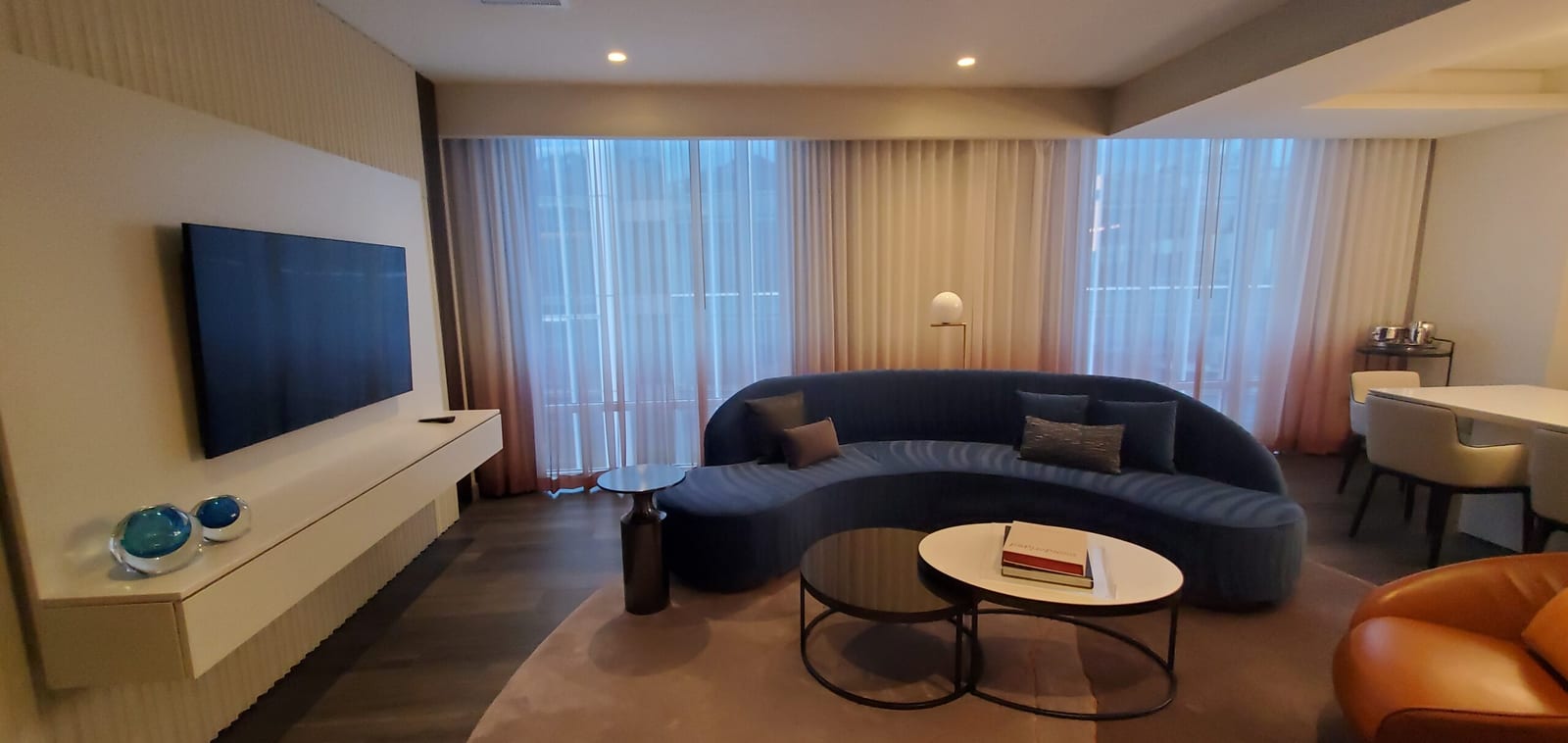 Marriott Bethesda Downtown at Marriott HQ Presidential Suite curved sectional living room