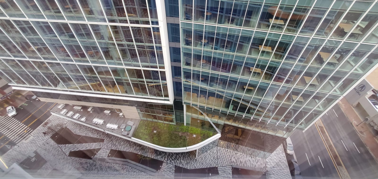 View looking down from the 13th floor into Sorenson Plaza and Marriott HQ at night